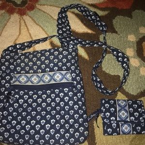 A cross body vera Bradley purse and wallet
